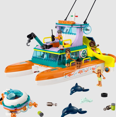 Toy boat set with figures and accessories on a white background