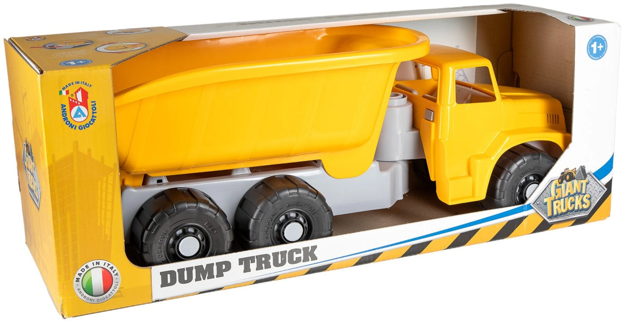 Boxed Androni Giant Trucks yellow dump truck with open front packaging