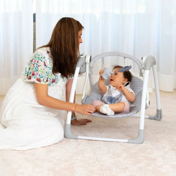 Asalvo Daddy Hippo Musical Baby Swing shown with a baby and adult during use