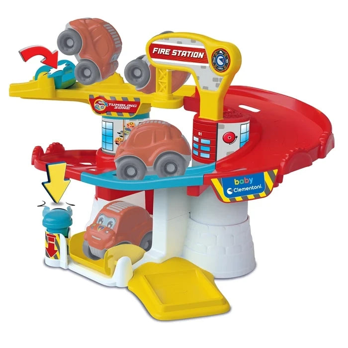 Baby Clementoni Fire Station showing the red rescue car at different positions on the track, with a yellow launching platform, blue lever and yellow exit ramp.