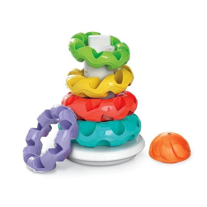 Baby Clementoni Stacking Rings with green, yellow, red and turquoise rings on the central post, purple ring leaning against the base and orange dome placed beside the tower.