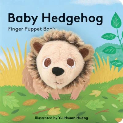 Cover of Baby Hedgehog Finger Puppet Book with plush hedgehog puppet and illustrated grassy background
