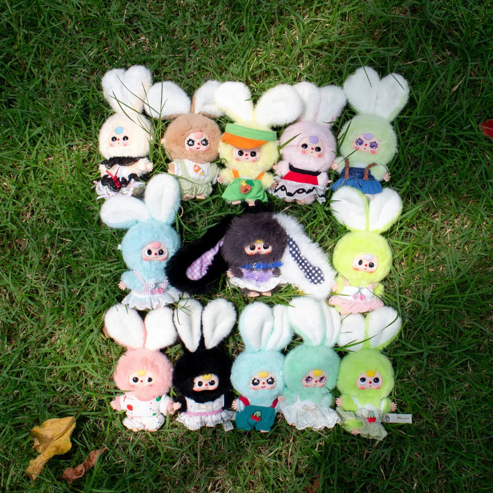 Full Baby Three Mini Tiny Rabbit blind box plush collection displayed outdoors in assorted colourful costumes