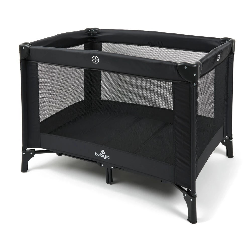 Babylo Alpha black travel cot front angle view with mesh sides and padded mattress