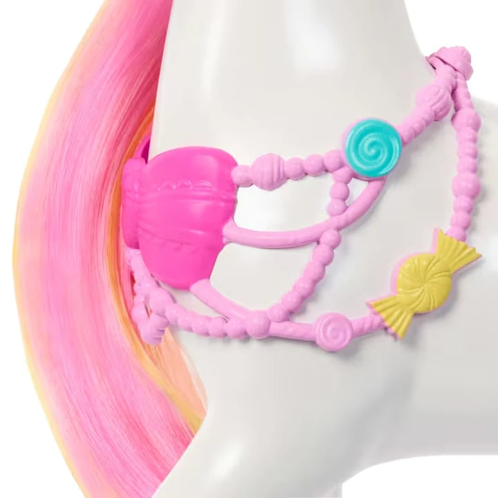 Close view of the Barbie Nutcracker horse wearing a pink candy necklace and harness
