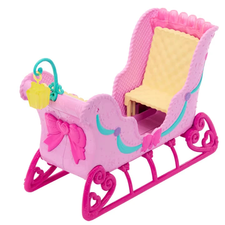 Pink Barbie Nutcracker sled with yellow seat, decorative bow and hanging lantern
