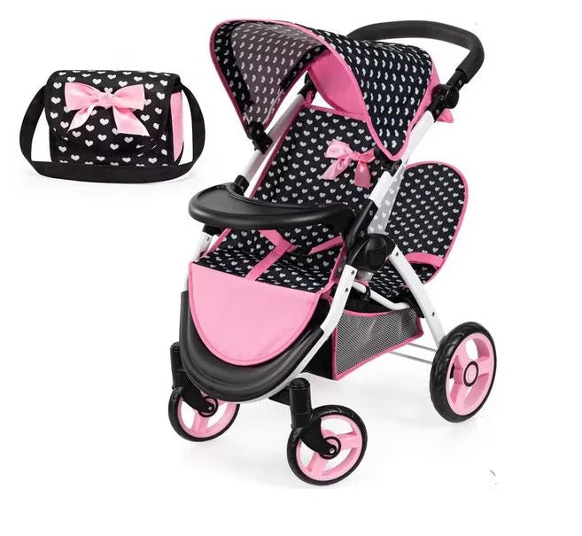 Black and pink heart patterned Bayer Twin Star doll pram with matching bag shown on white background