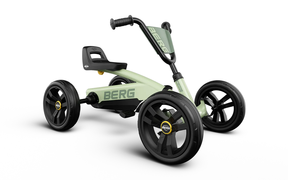 BERG Buzzy Green pedal go-kart shown from an angled front view with black wheels and green frame
