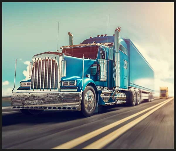 Brainstorm Tractor and Truck Torch and Projector image showing a blue semi truck travelling on the road