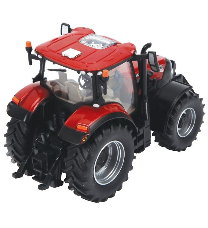 Britains Case Maxxum 150 tractor model displayed in rear three quarter view showing red cab roof, rear wheels with deep tread, rear hitch assembly, warning decals, and enclosed cab on a white background