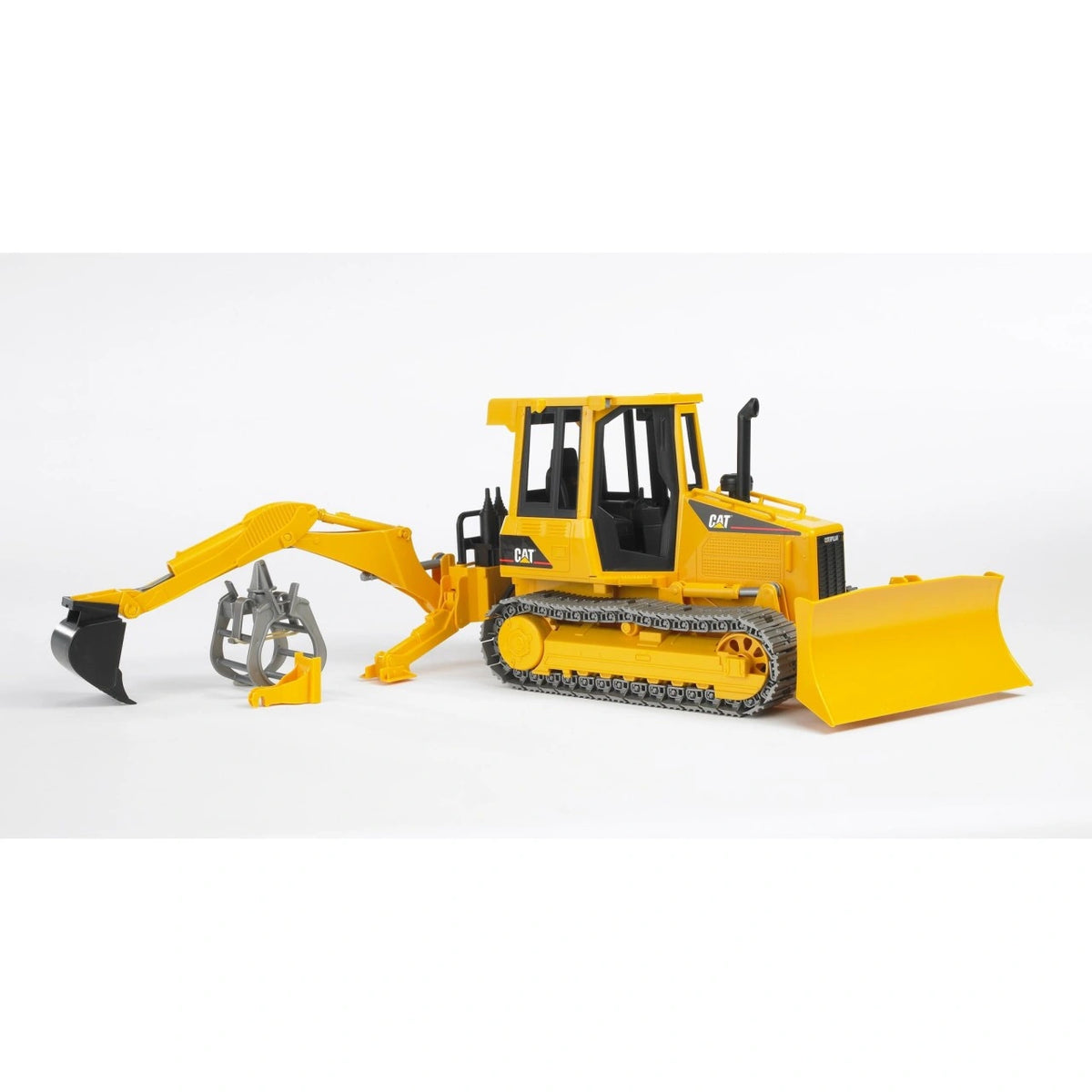 Side view of Bruder Rear Hydraulic Arm 02338 attached to a yellow CAT bulldozer, showing the extended excavator arm, black bucket, separate grey grab and front dozer blade.
