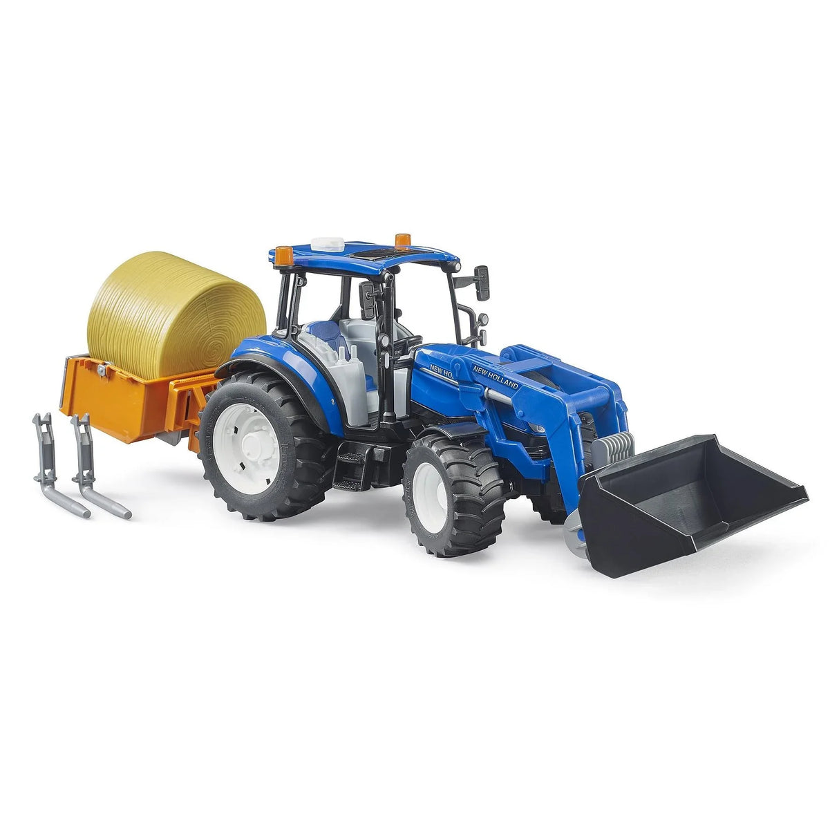 Bruder 2187 New Holland T5.120 tractor with front loader carrying hay bale and forks in Ireland