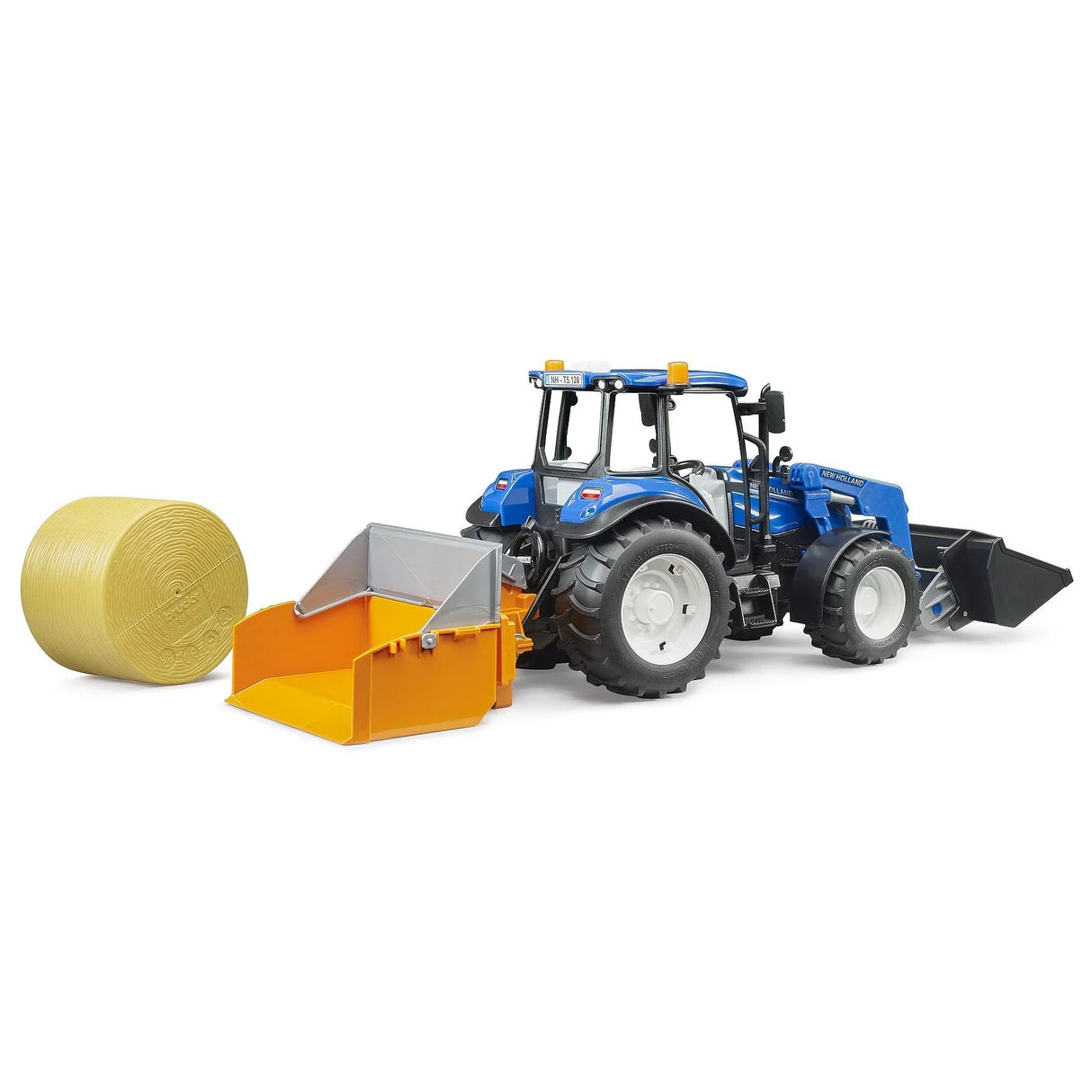 Bruder 2187 New Holland T5.120 farm tractor toy with bale trailer and loader attachment in Ireland