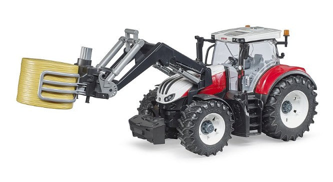 Bruder Bale Gripper attached to tractor with round bale Ireland