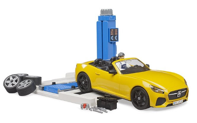 Bruder roadster with mechanic and lift at service centre Ireland