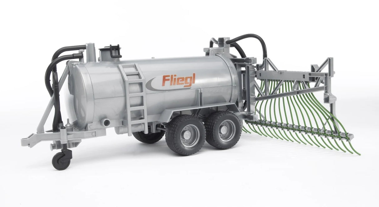 Silver Fliegl farm toy barrel trailer with green spread tubes folded out