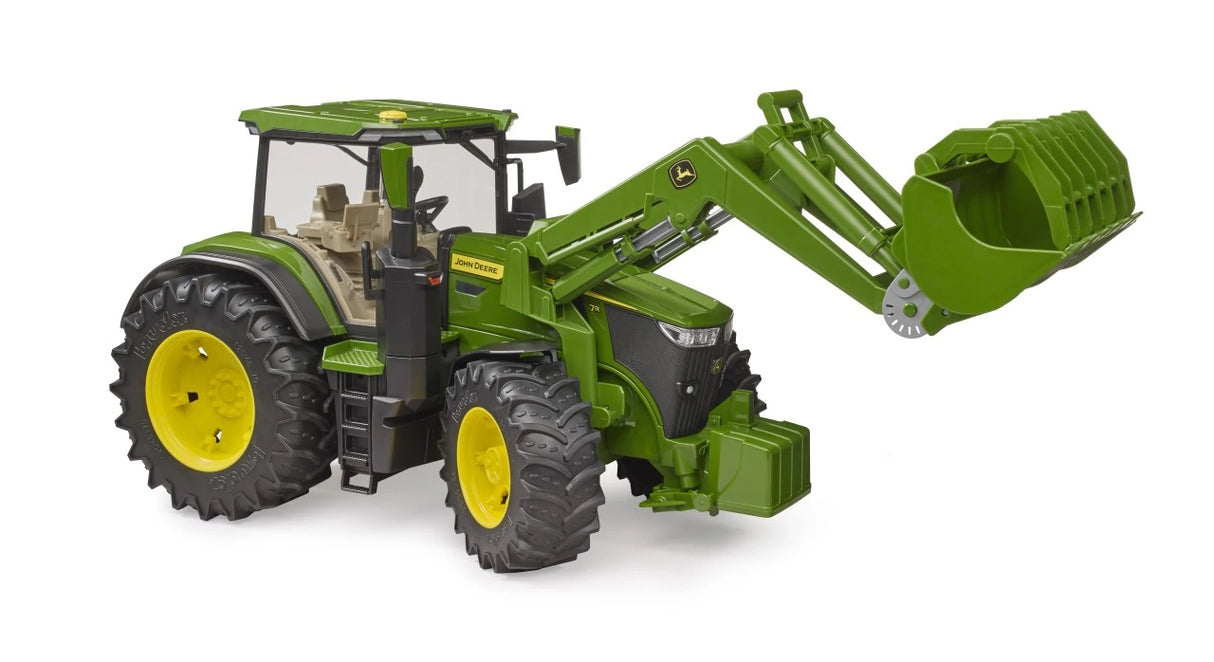 Side view of green John Deere 7R 350 farm toy tractor with raised front loader
