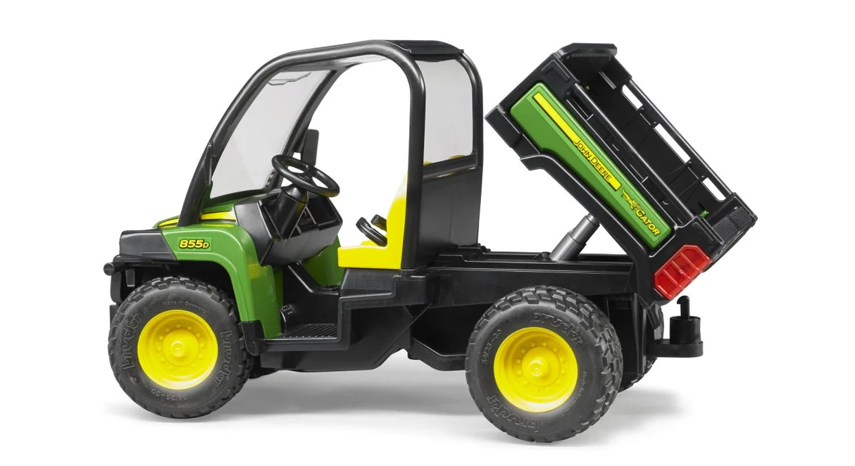 Bruder John Deere Gator 855D shown with rear load bed tipped up, side profile showing cab, wheels and working tipping platform