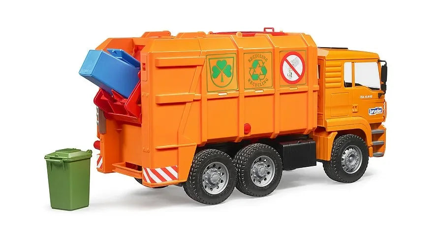 Orange Bruder MAN TGA refuse truck toy with a blue bin lifted at the rear and a green bin beside it on a white background.