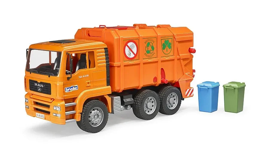 Orange Bruder MAN TGA refuse truck toy with two small refuse bins beside the vehicle on a white background.