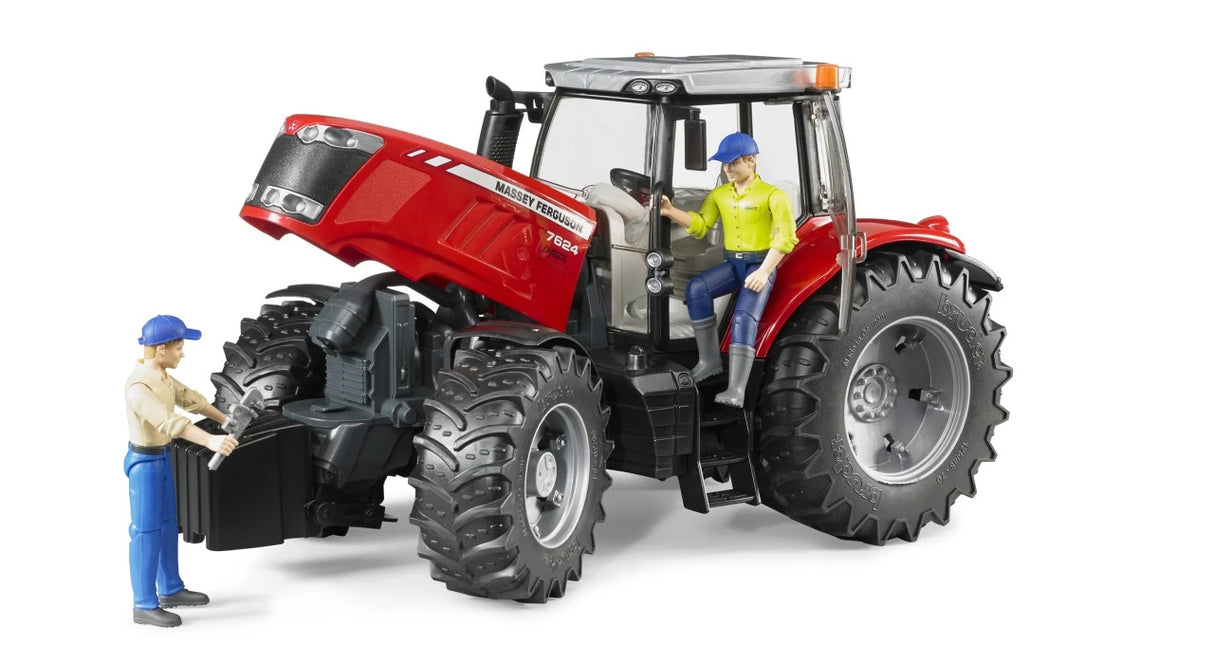 Red Massey Ferguson 7624 farm toy tractor with bonnet open beside two figures