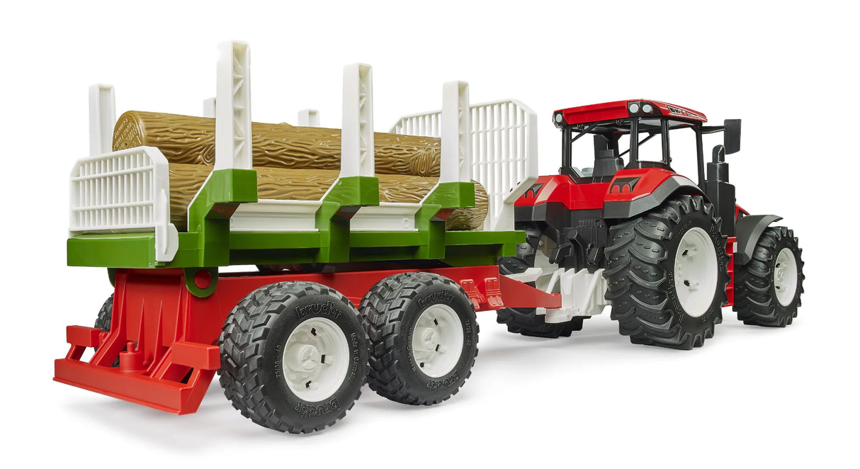 Rear view of a red Roadmax tractor attached to a green forestry trailer carrying three brown tree trunk pieces between white uprights on a white background.