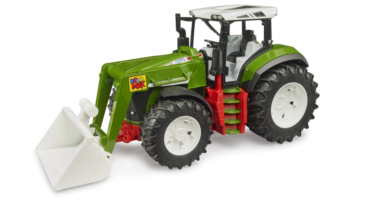 Bruder Roadmax tractor with green body, open cab seating, white front loader bucket and black wheels with white rims on a white background.