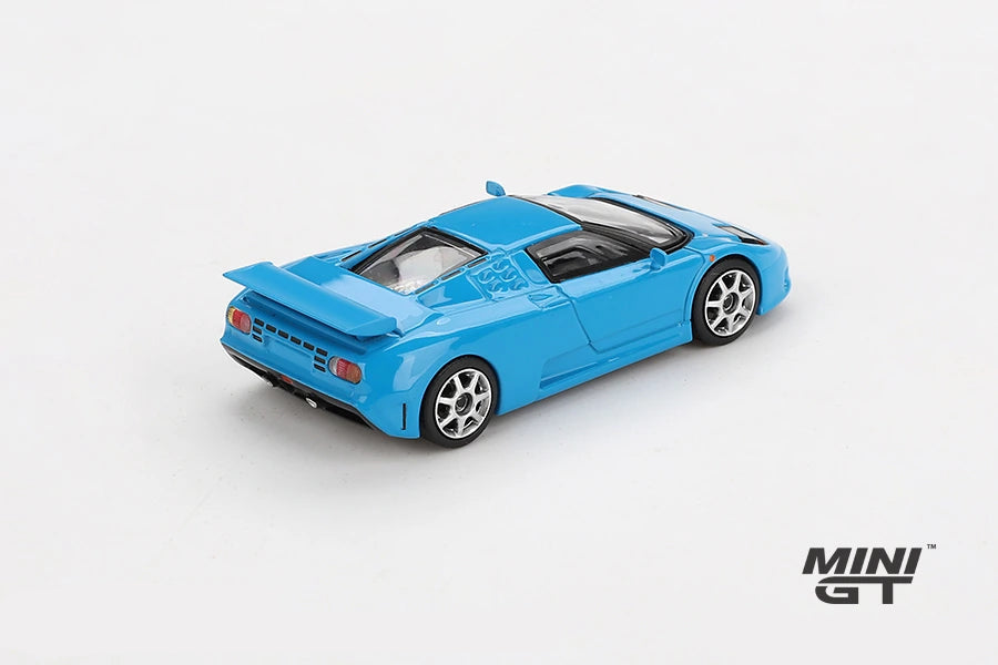 Mini GT Bugatti EB110 Super Sport viewed from the rear and side showing the large rear wing, rear lights and silver wheels