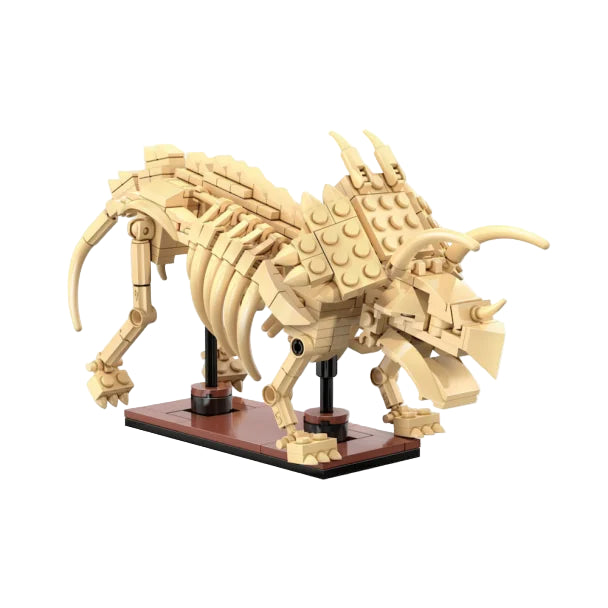 CaDA Triceratops skeleton brick model on brown base showing detailed skull, ribs and curved tail bones