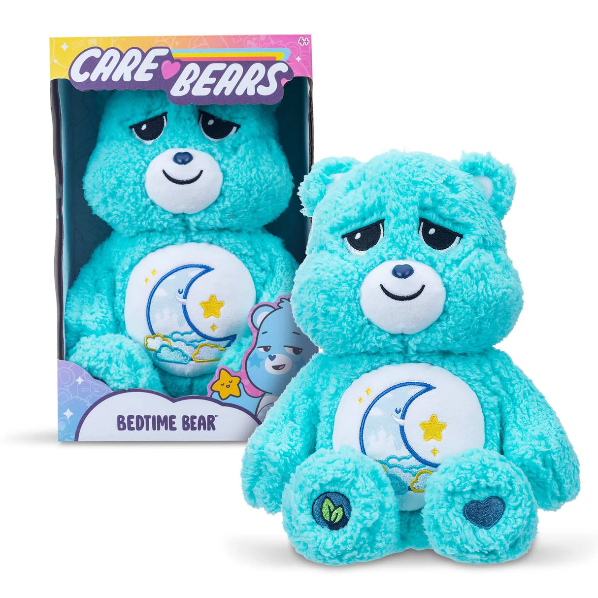 Care Bears Cozy Bedtime Bear 14″ plush displayed in retail box with dreamy moon and star badge in Ireland.