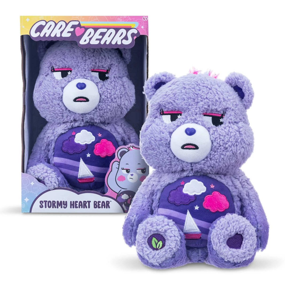 Care Bears Cozy Stormy Heart Bear in retail box highlighting soft purple fur and unique badge in Ireland.