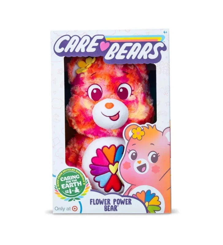 Care Bears Flower Power Bear 35 cm plush toy shown in retail box with colourful heart-flower badge in Ireland.