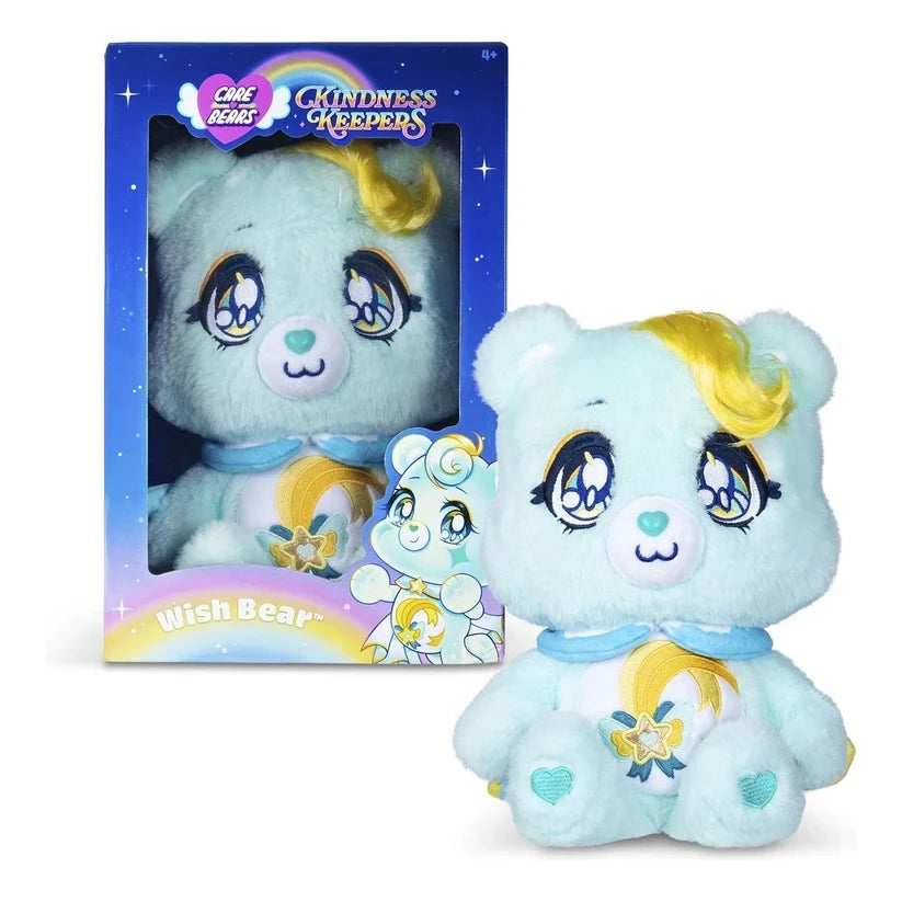 Care Bears Kindness Keepers Wish Bear plush displayed beside its blue collector box, showing the turquoise bear with yellow hair curl, star belly badge and matching packaging artwork.