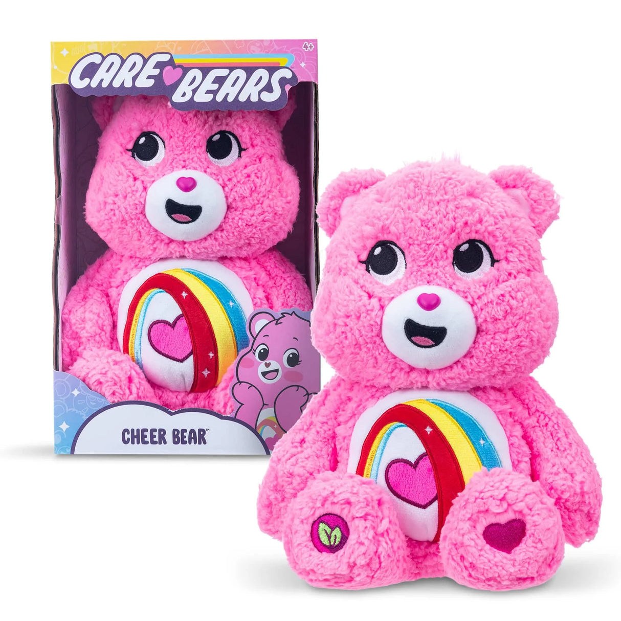Care Bears Cozy Cheer Bear 14 inch plush angled view highlighting embroidered rainbow heart belly badge in Ireland.