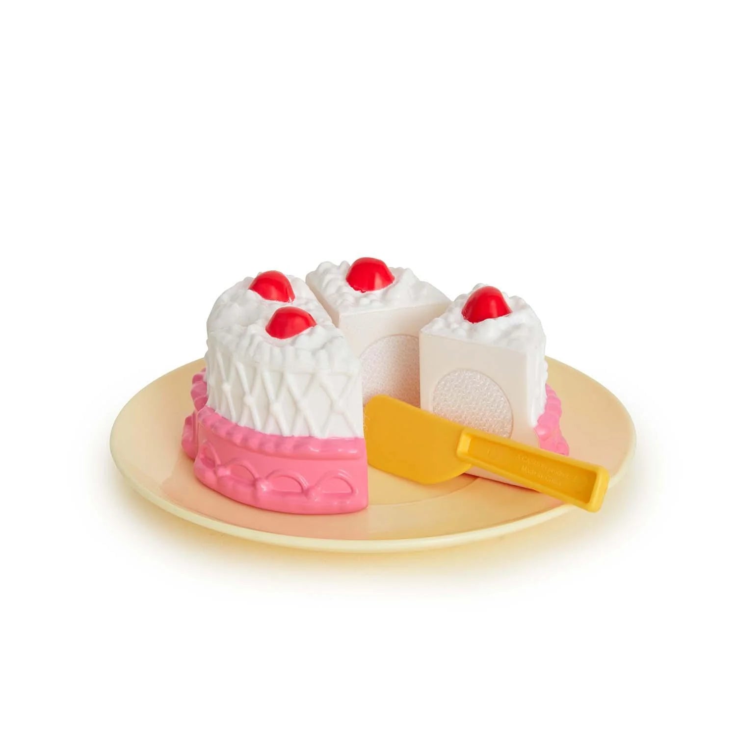 Casdon toy cake with slice separator on plate – Ireland