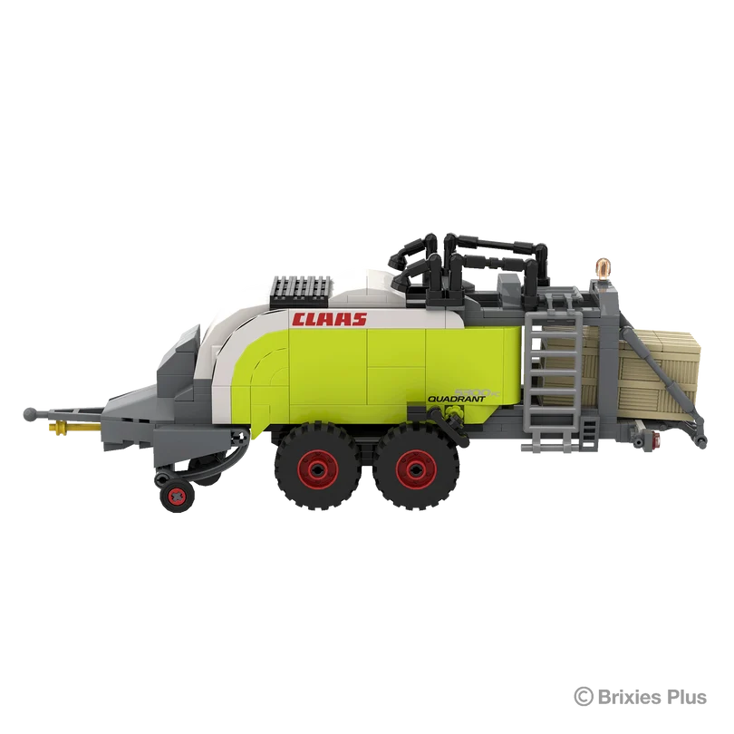 Side profile of the BRIXIES Plus CLAAS QUADRANT 5300 FC showing the side ladder, lime green baler body, twin red rimmed wheels and drawbar