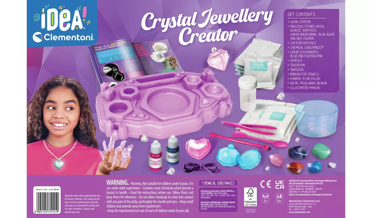 Back of the Clementoni Crystal Jewellery Creator packaging showing the purple workstation, crystal growing chemicals, coloured liquids, gemstone specimens, jewellery charms, tools and printed contents list.