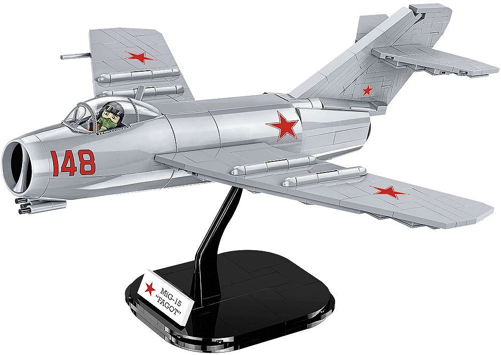 COBI MiG-15 Fagot model with pilot figure on black display stand against a white background