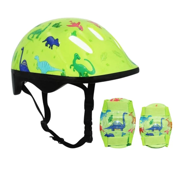Kids dinosaur helmet and matching pads shown together in a side view with bright green shell, vents, and colourful dinosaur graphics on a white background