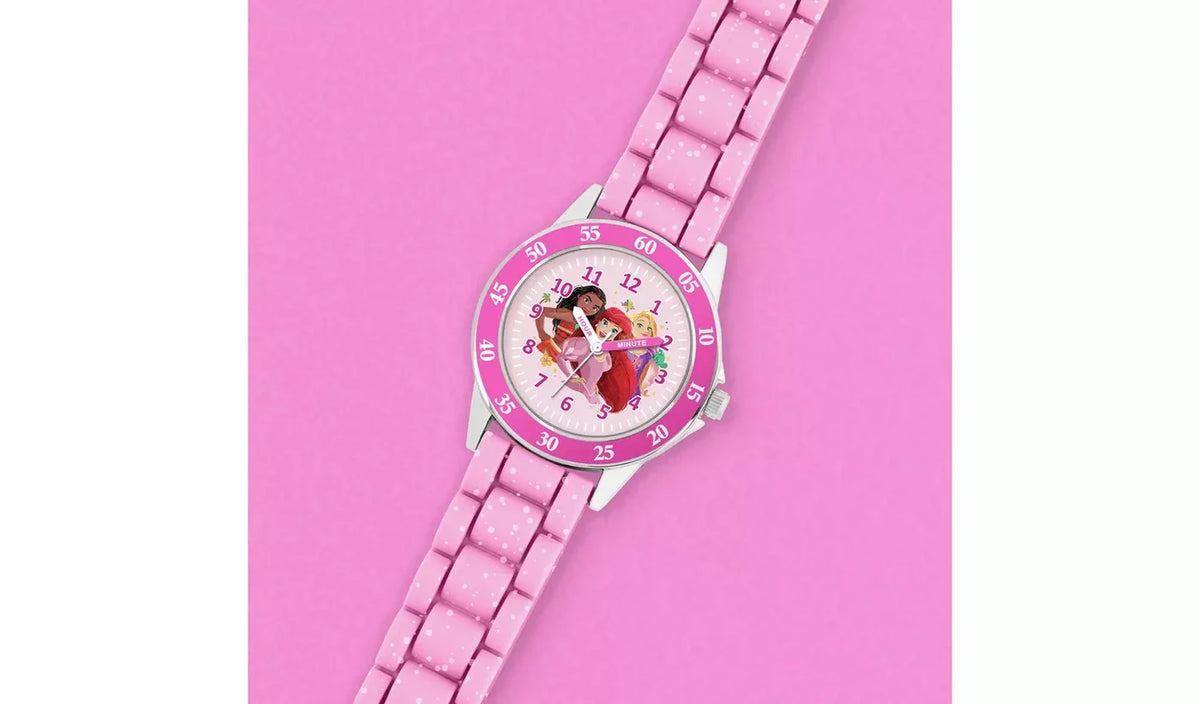 Disney Princess Pink Time Teacher Watch shown on a pink background with princess dial, numbered minute bezel and pink strap