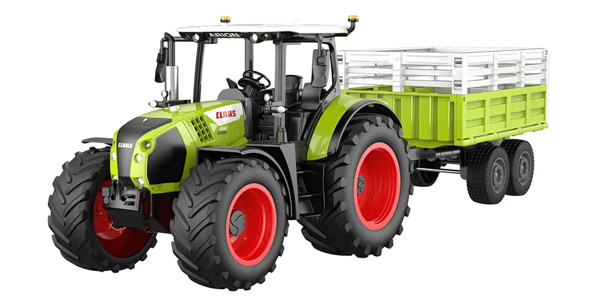 Angled view of Double Eagle CLAAS Arion 1:24 remote control tractor hauling green and white farm trailer with red wheels