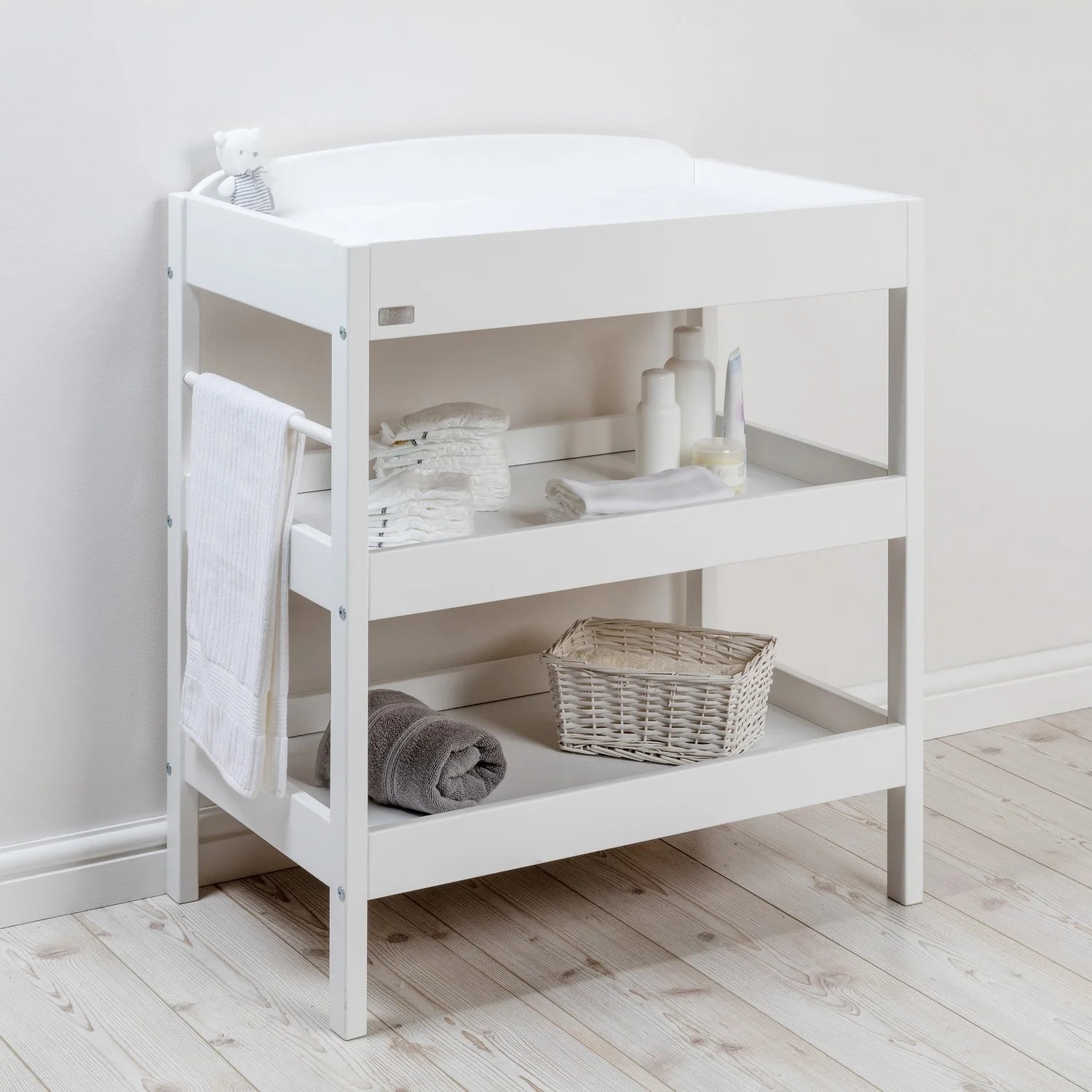 East Coast Clara Dresser White Changing Unit side view beside grey wall Ireland