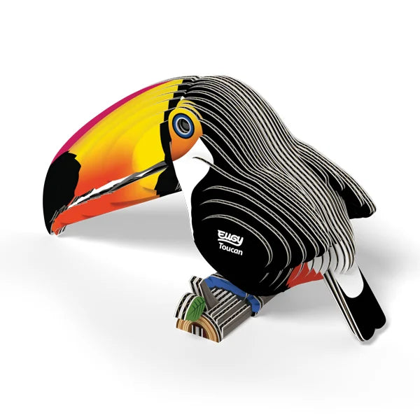 Completed EUGY Toucan 3D cardboard model with colourful gradient beak, black body and layered cardboard detailing