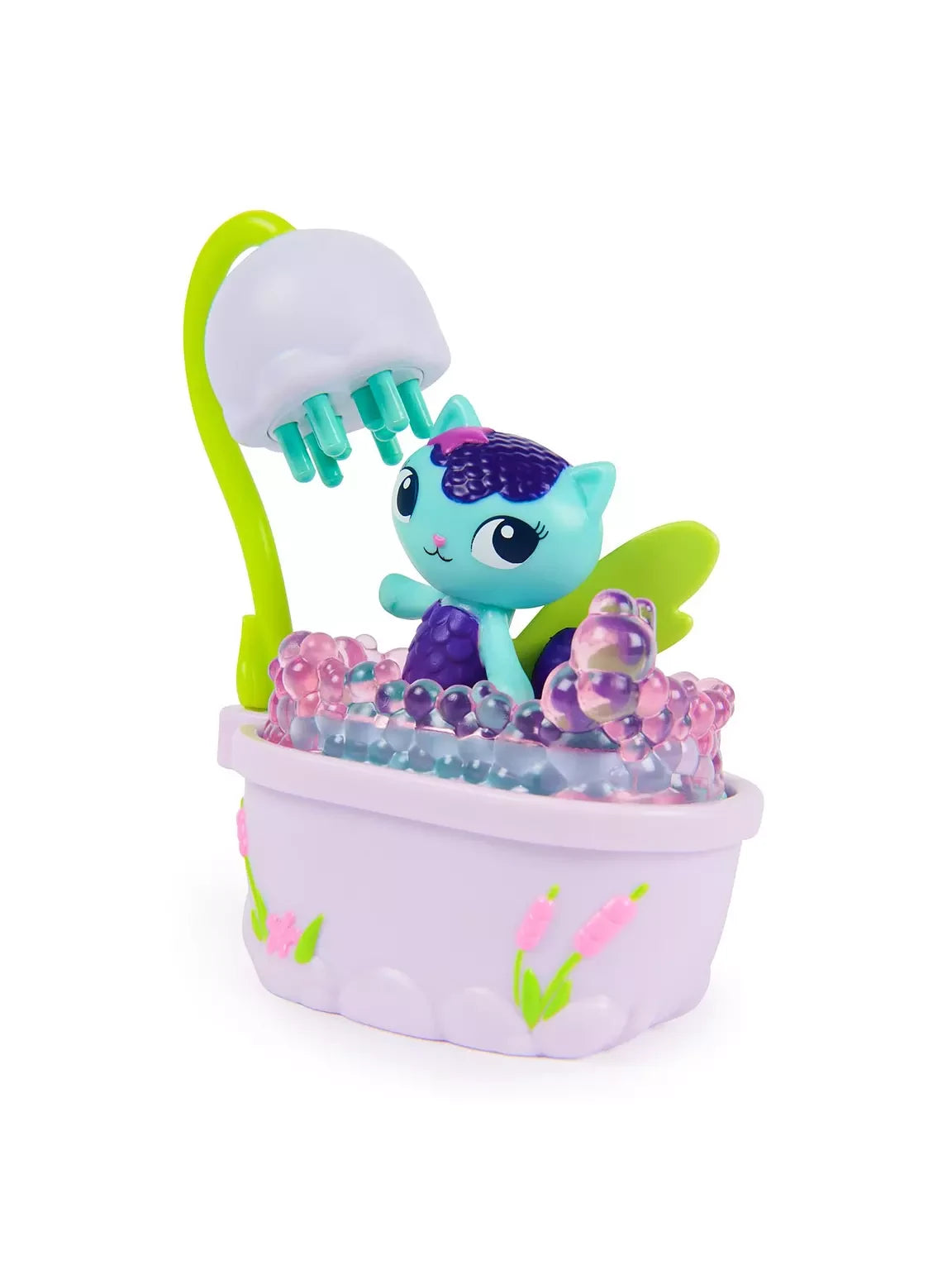 MerCat sitting in the lavender bathtub surrounded by pink, purple and blue bubbles beneath the white shower head