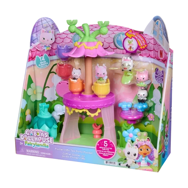 Gabby's Dollhouse Fairylandia Flutter-riffic Tea Party Playset in angled retail packaging, showing the pink flower-shaped tea party stand, colourful teacups, miniature Gabby Cats and fairy garden decorations.