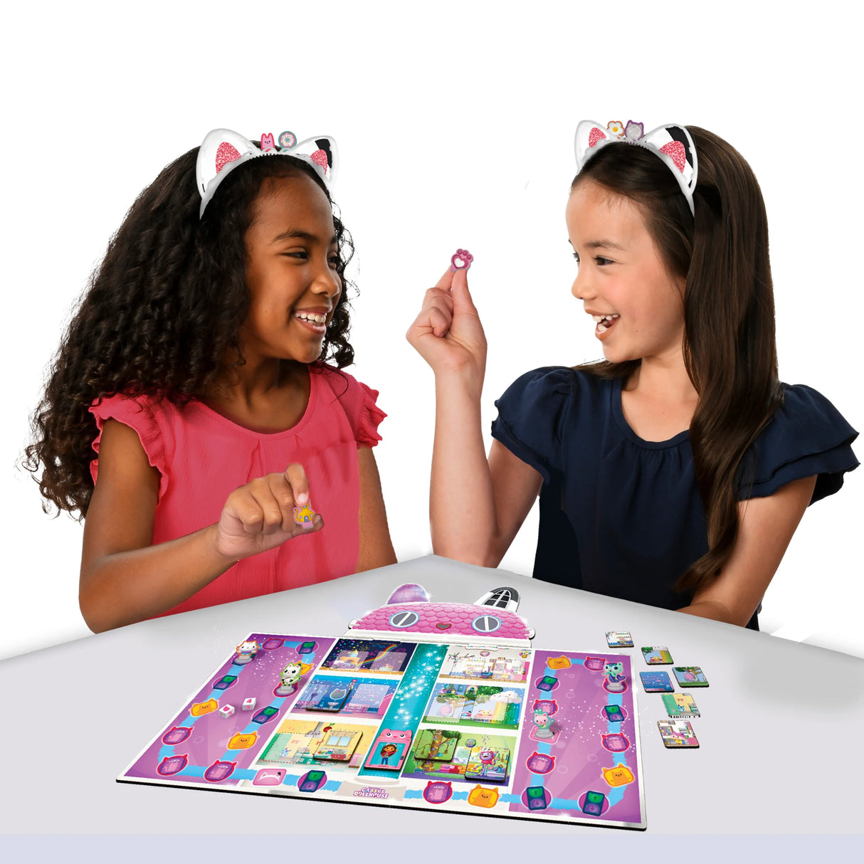 Children playing Gabby's Dollhouse Meow Mazing board game with headbands Ireland