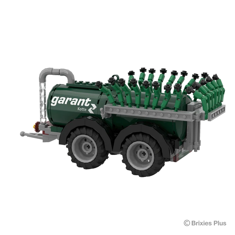 Rear angled view of the BRIXIES Plus Garant Kotte Vacuum Tanker showing the tandem wheels and folded green spreading equipment across the back