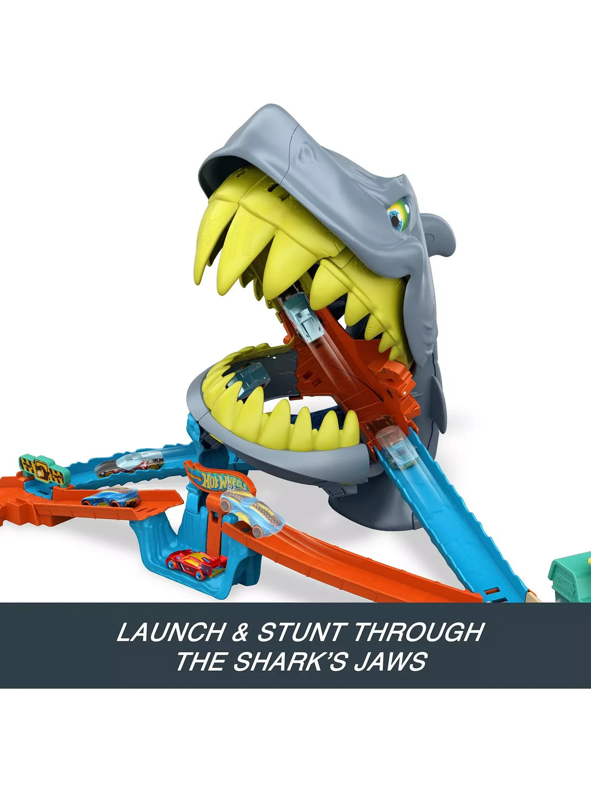 Hot Wheels City Shark Chomp Beach Playset with car launching through the shark jaws