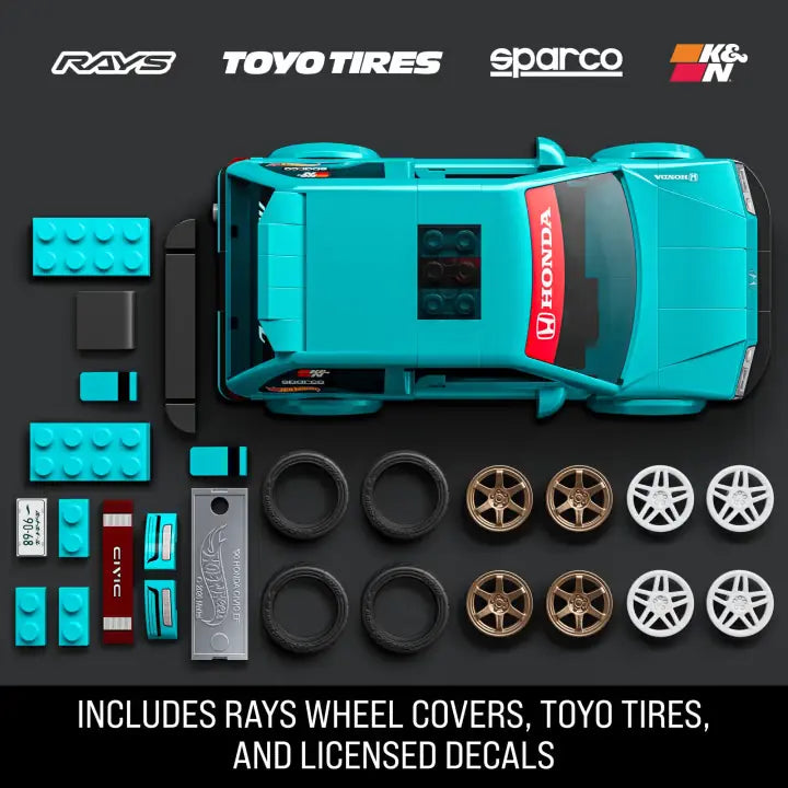 Top view of the turquoise Custom ’90 Honda Civic EF with tyres, bronze and white wheel covers and racing decals