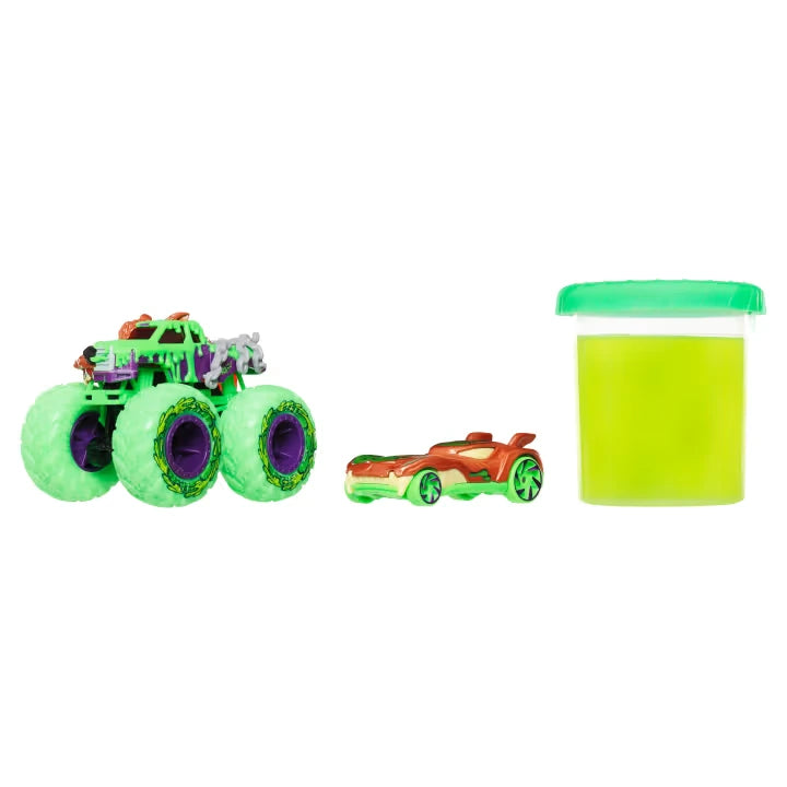 Hot Wheels Monster Trucks Mutant Chaos green monster truck with orange and green car and tub of slime